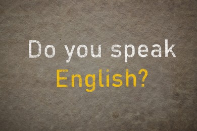 Image of Do You Speak English? text on old paper. Language course