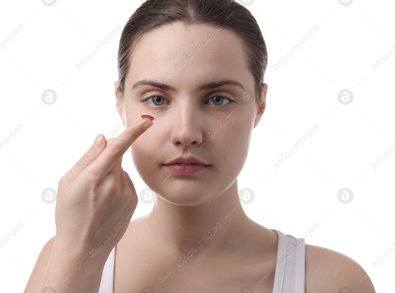 Photo of Woman with red color contact lens on white background