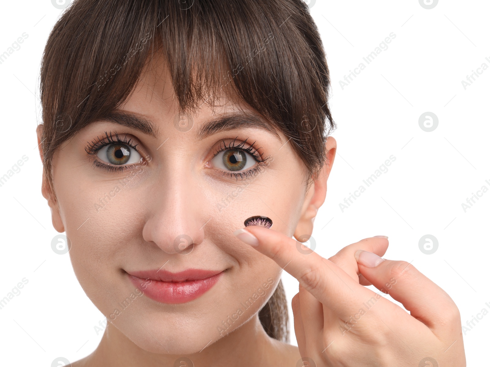 Photo of Young woman with color contact lens on white background, closeup