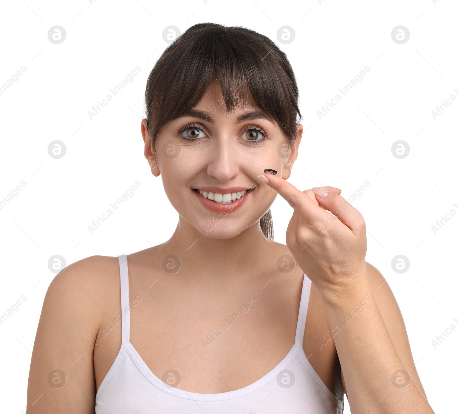 Photo of Young woman with color contact lens on white background