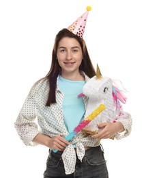 Photo of Happy woman with unicorn shaped pinata and stick on white background