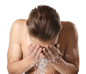 Photo of Man washing his face on white background