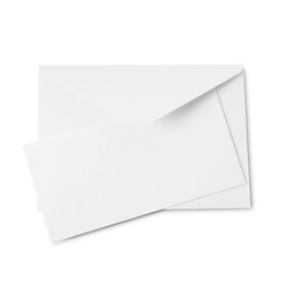 Photo of Envelope and card isolated on white, top view. Mockup for design