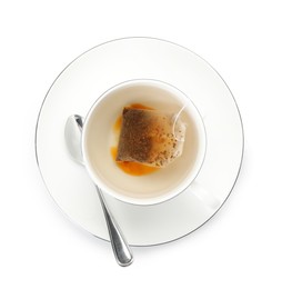 Photo of Tea bag in cup with hot drink isolated on white, top view