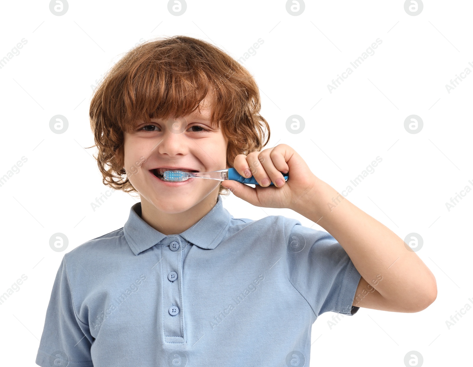 Photo of Cute boy brushing his teeth on white background