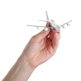 Photo of Woman with plane model on white background, closeup