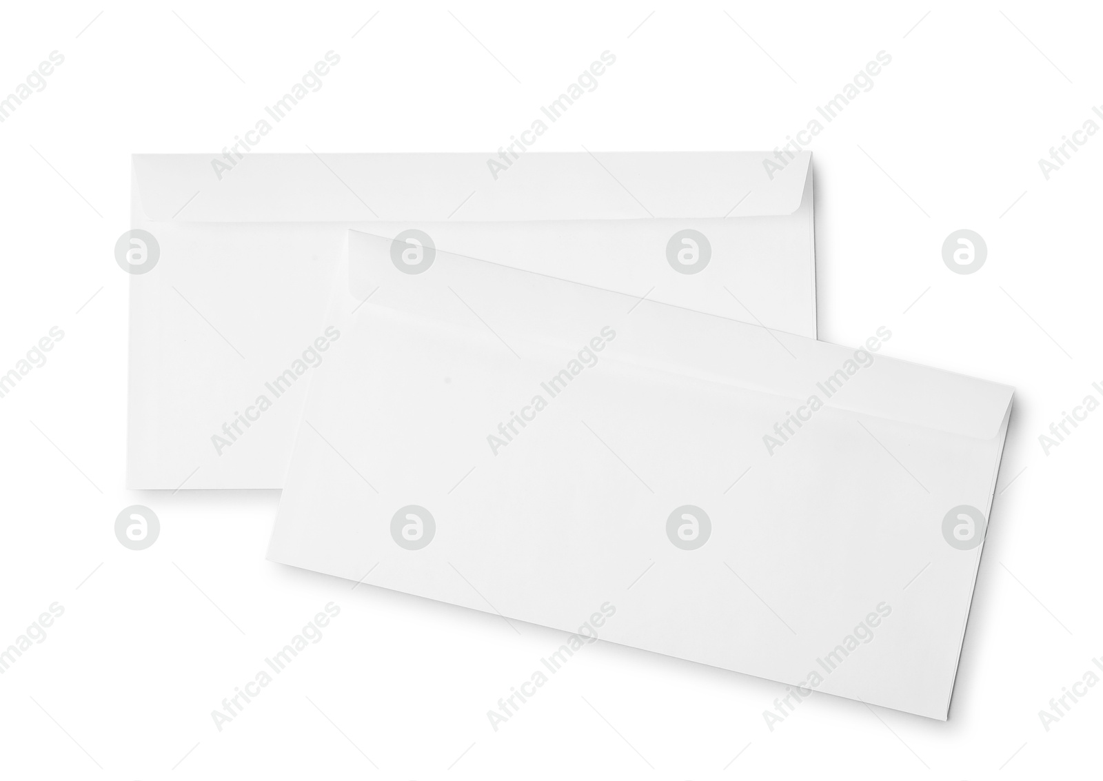 Photo of Envelopes isolated on white, top view. Mockup for design