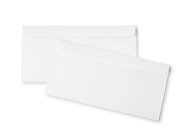 Photo of Envelopes isolated on white, top view. Mockup for design