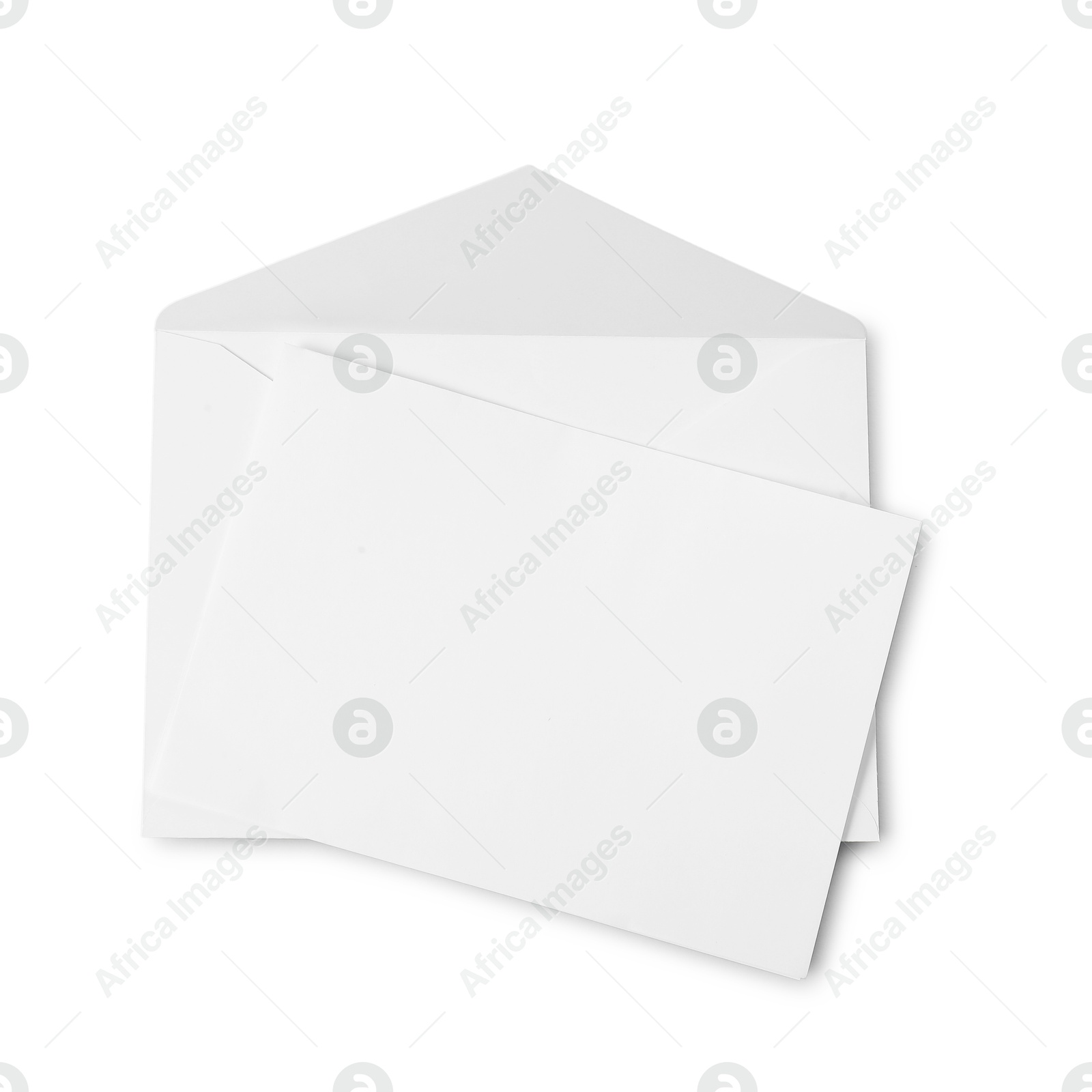 Photo of Envelope and card isolated on white, top view. Mockup for design