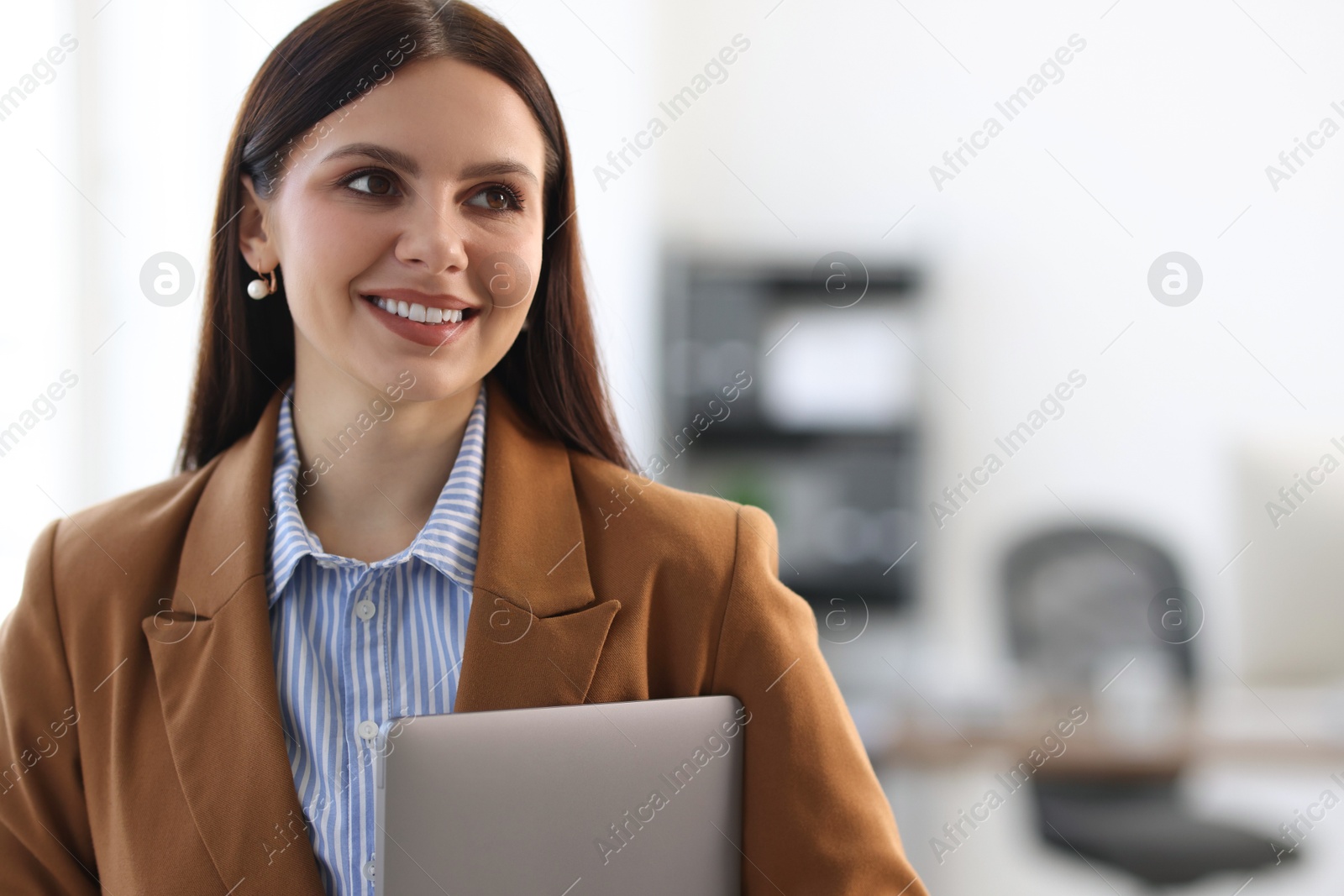 Photo of Portrait of banker with laptop in office, space for text