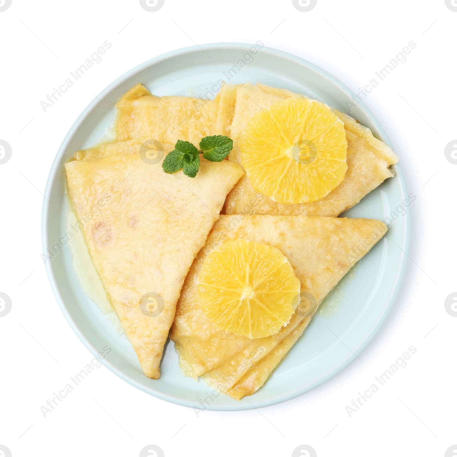 Photo of Delicious Crepes Suzette dessert isolated on white, top view