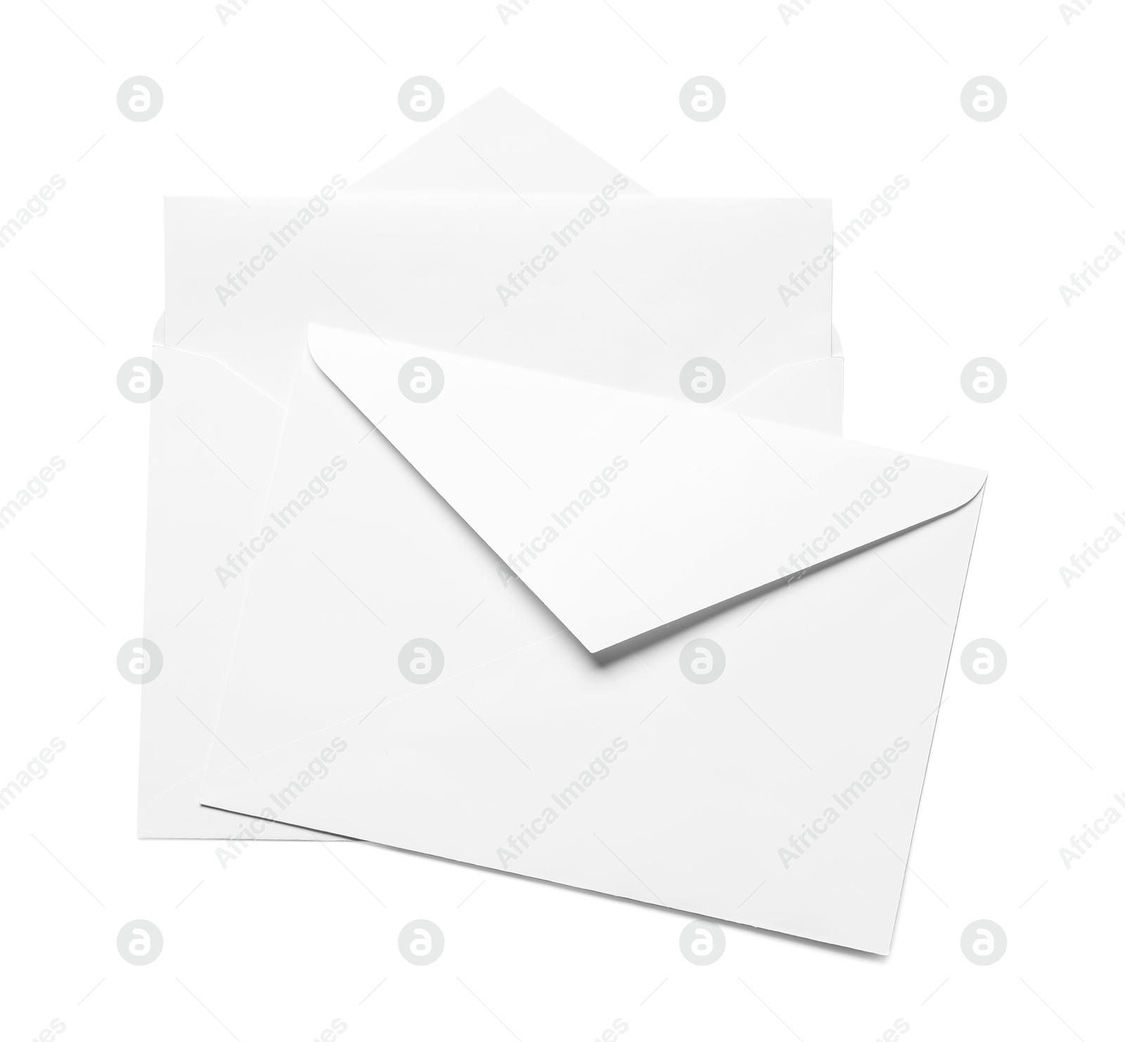 Photo of Envelopes with card isolated on white, top view. Mockup for design