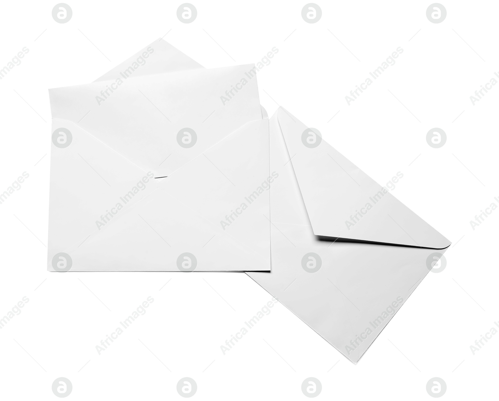 Photo of Envelopes with card isolated on white, top view. Mockup for design