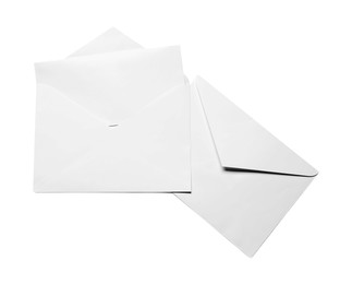 Photo of Envelopes with card isolated on white, top view. Mockup for design