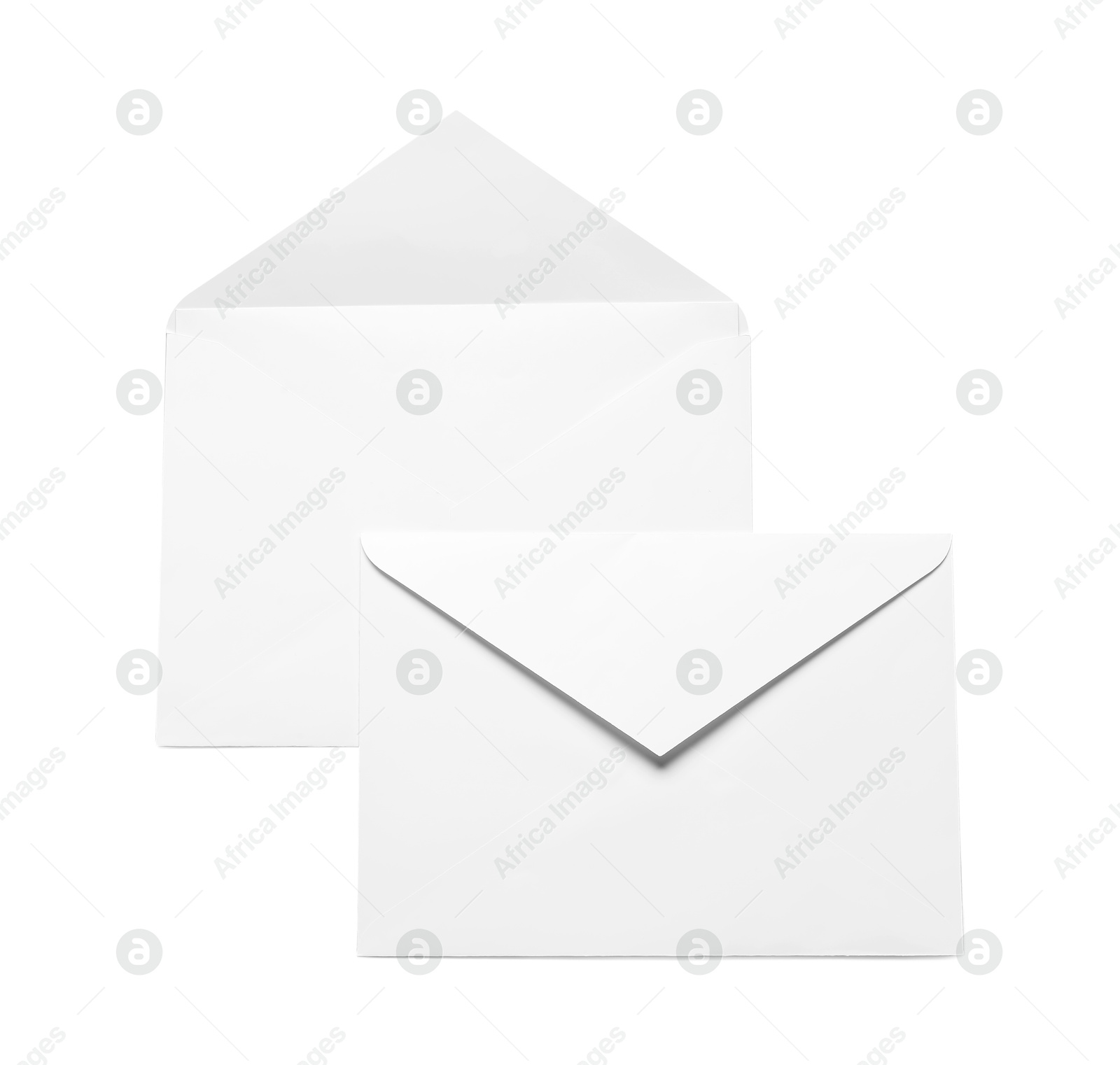 Photo of Envelopes isolated on white, top view. Mockup for design