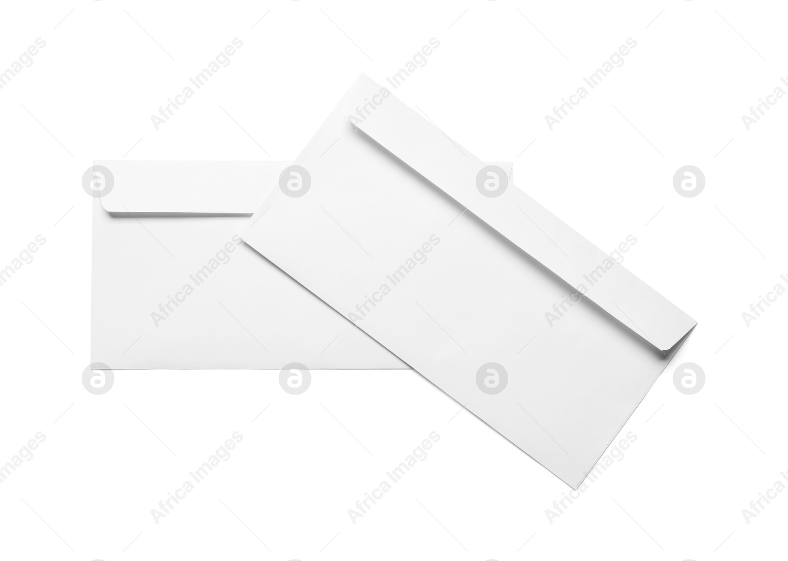 Photo of Envelopes isolated on white, top view. Mockup for design