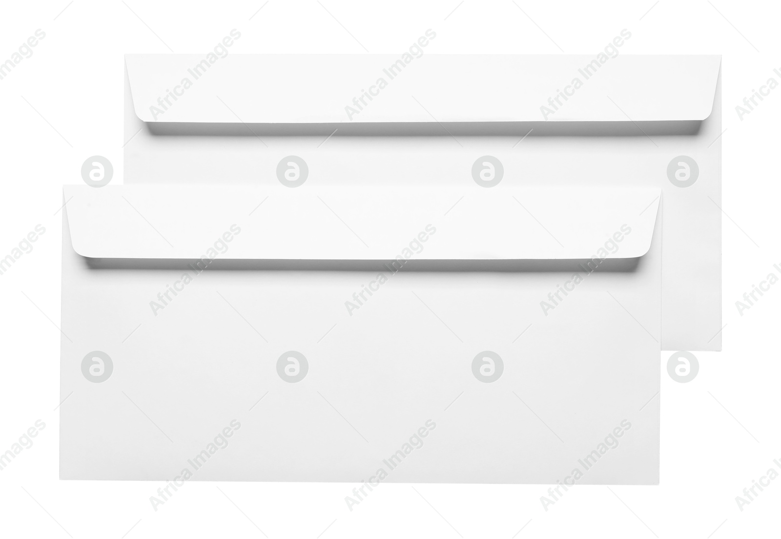 Photo of Envelopes isolated on white, top view. Mockup for design