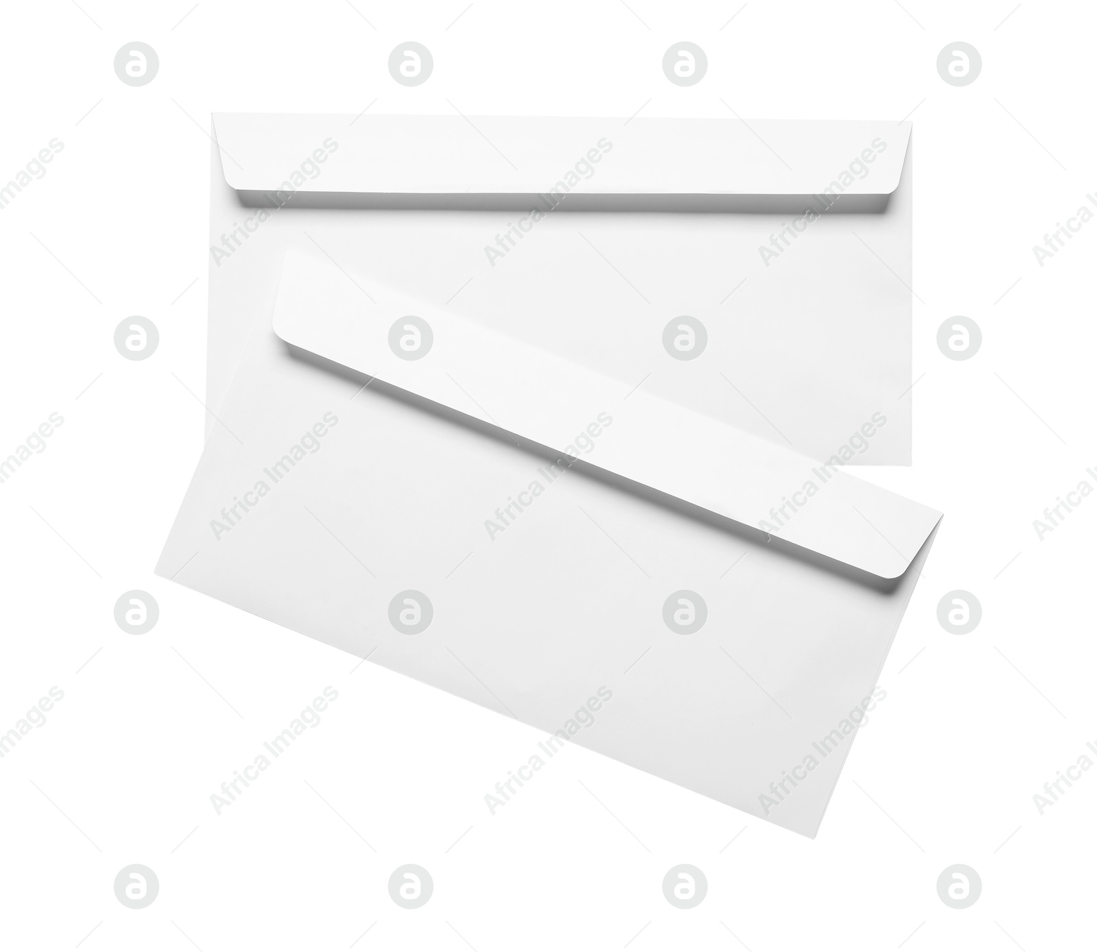 Photo of Envelopes isolated on white, top view. Mockup for design