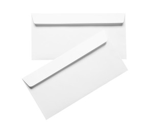 Photo of Envelopes isolated on white, top view. Mockup for design