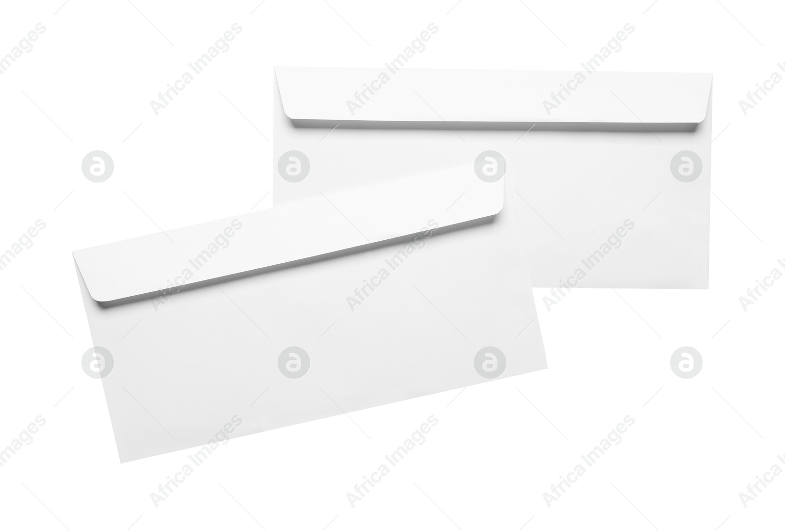 Photo of Envelopes isolated on white, top view. Mockup for design