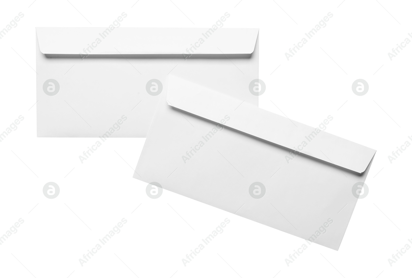 Photo of Envelopes isolated on white, top view. Mockup for design