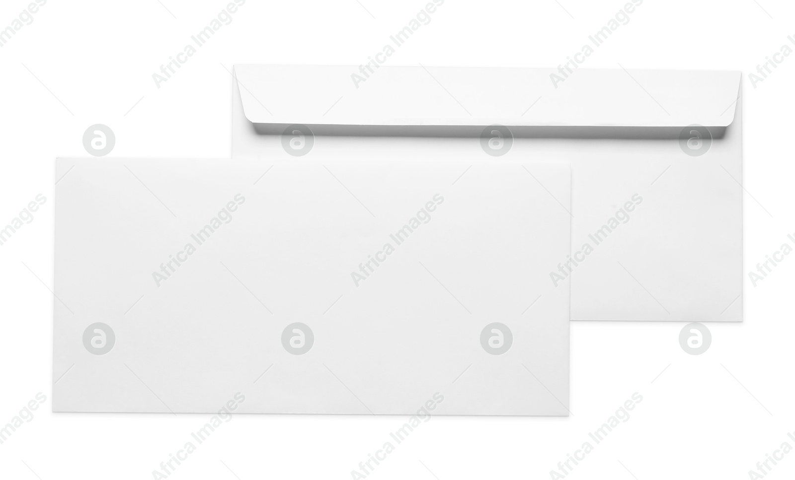 Photo of Envelopes isolated on white, top view. Mockup for design