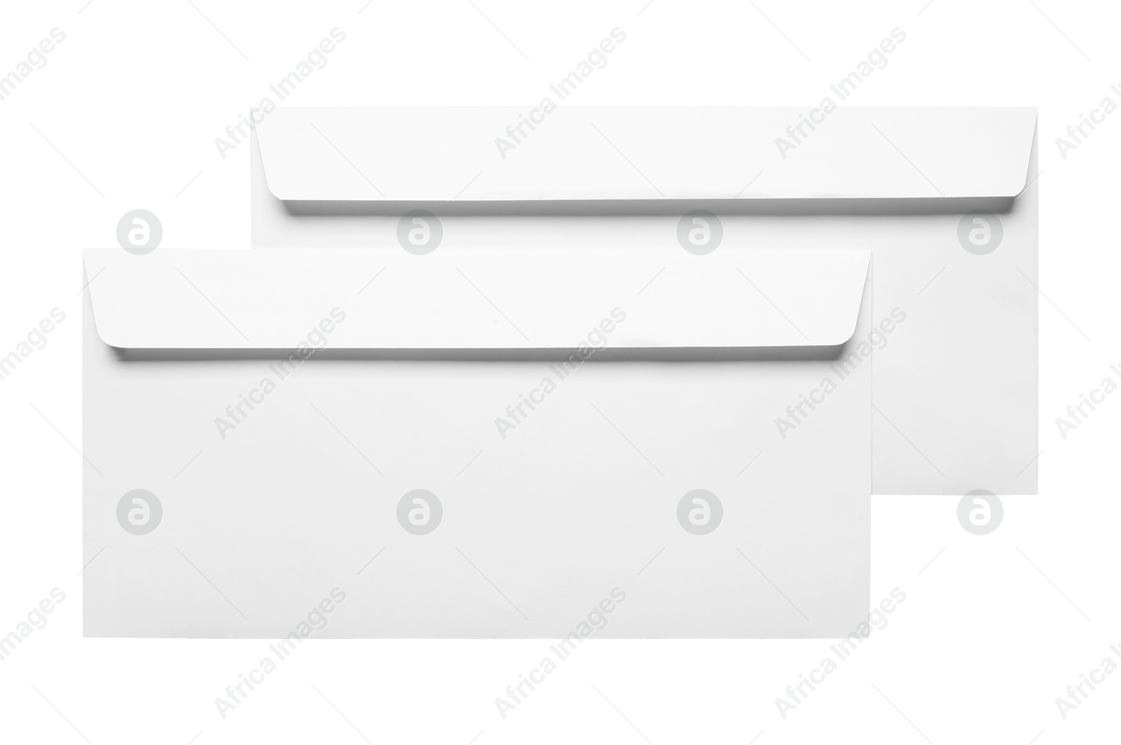 Photo of Envelopes isolated on white, top view. Mockup for design