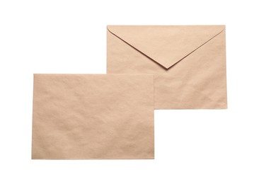 Photo of Envelopes isolated on white, top view. Mockup for design