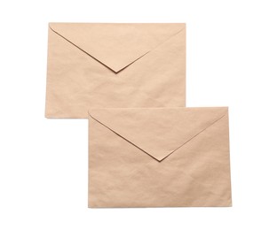 Photo of Envelopes isolated on white, top view. Mockup for design