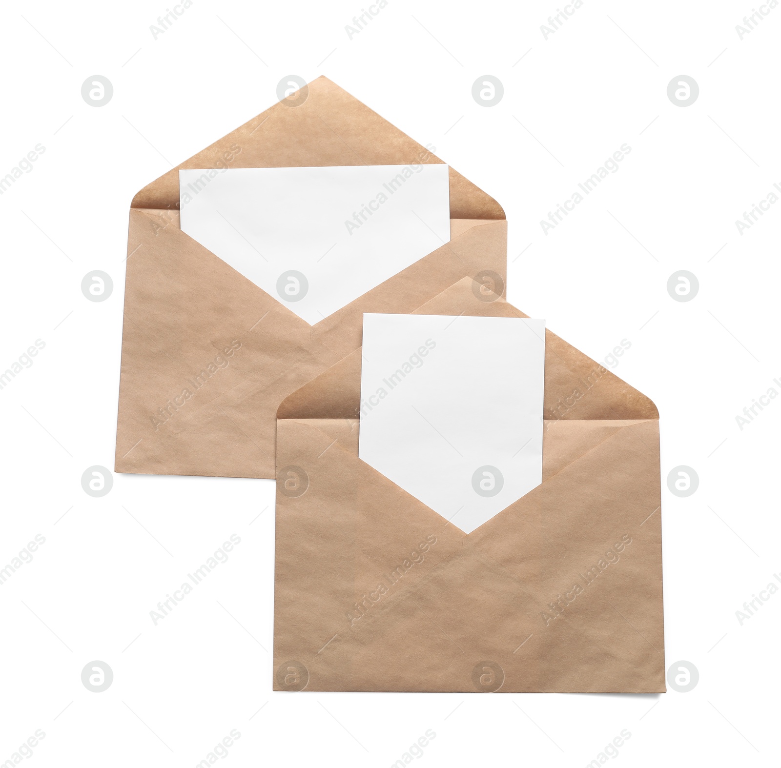 Photo of Envelopes isolated with cards on white, top view. Mockup for design