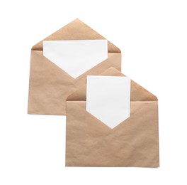 Photo of Envelopes isolated with cards on white, top view. Mockup for design