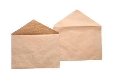 Photo of Envelopes isolated on white, top view. Mockup for design