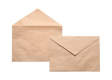 Photo of Envelopes isolated on white, top view. Mockup for design