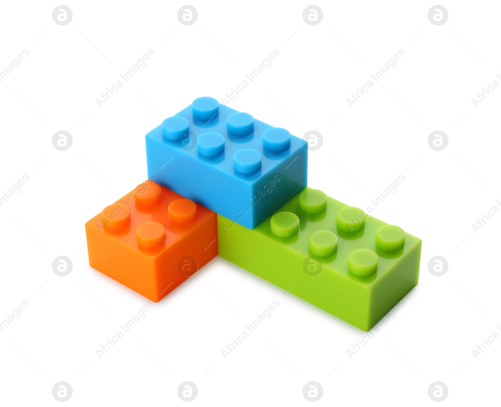 Photo of Construction toy. Figure made with building bricks isolated on white