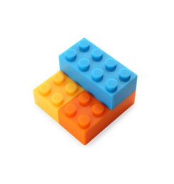 Photo of Construction toy. Figure made with building bricks isolated on white