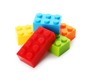 Photo of Construction toy. Building bricks isolated on white