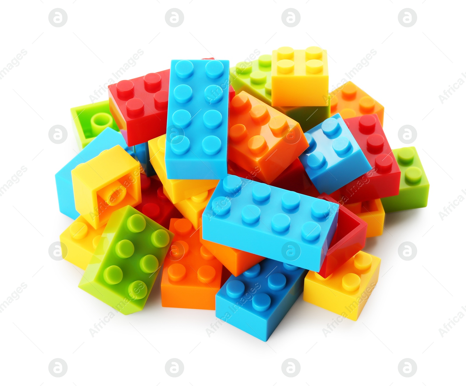 Photo of Construction toy. Pile of building bricks isolated on white