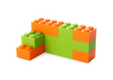 Photo of Construction toy. Figure made with building bricks isolated on white