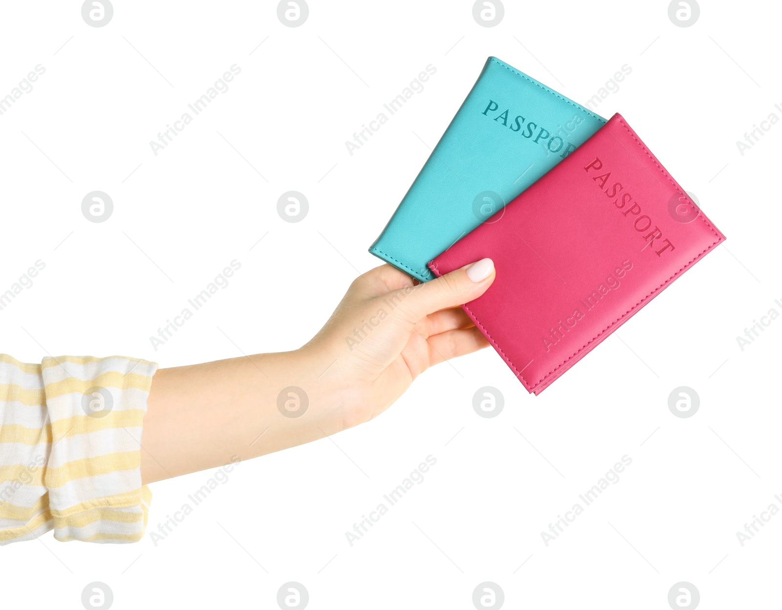 Photo of Woman holding passports in color covers on white background, closeup