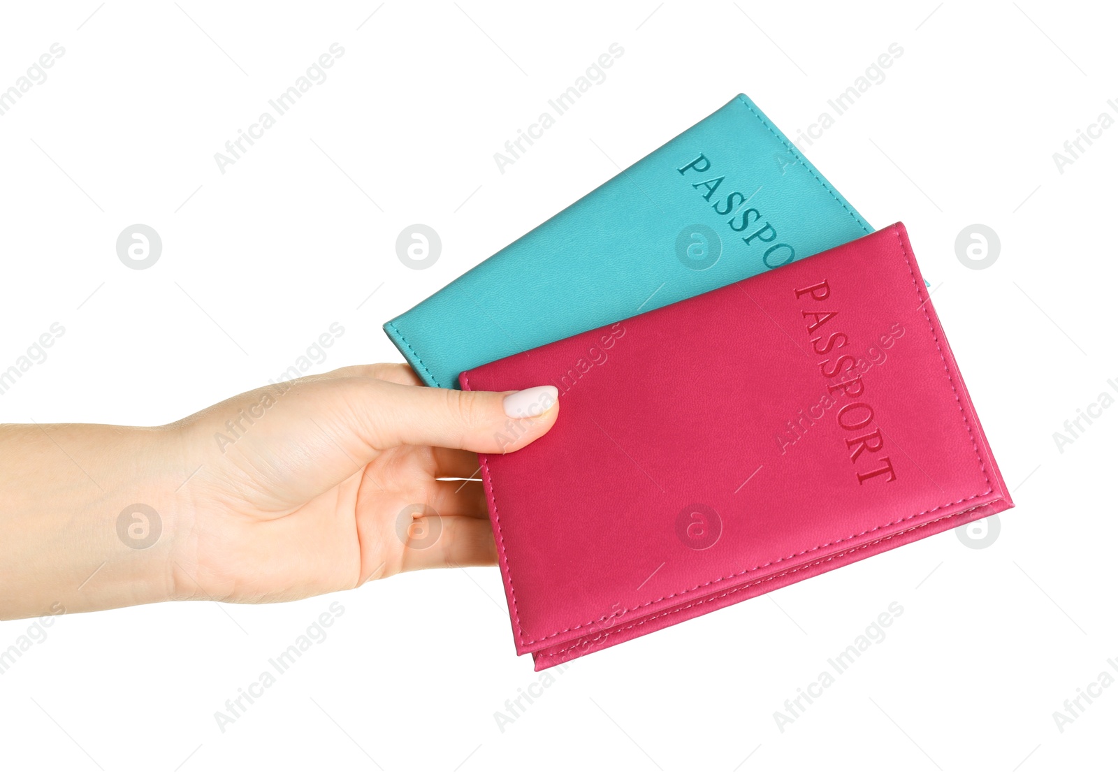 Photo of Woman holding passports in color covers on white background, closeup