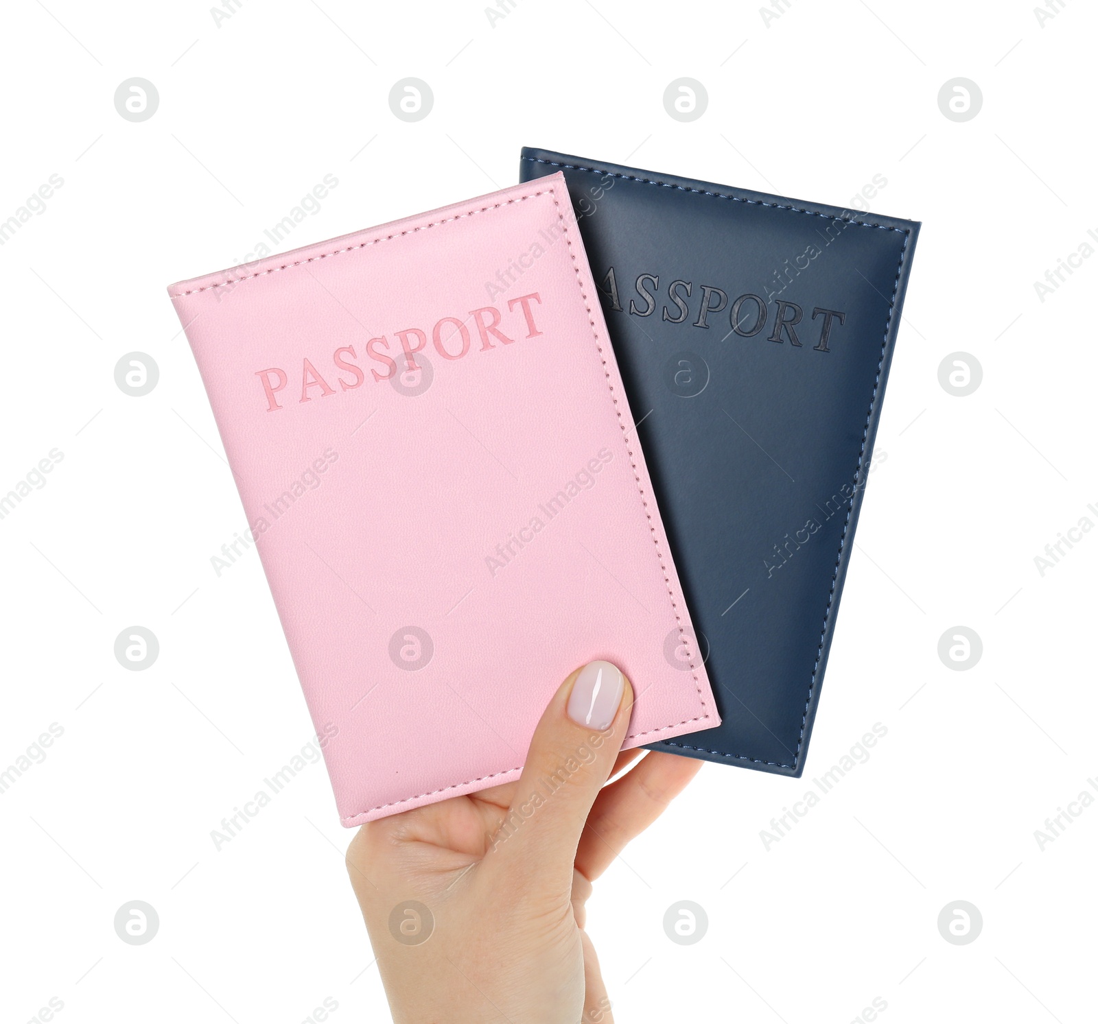 Photo of Woman holding passports in color covers on white background, closeup