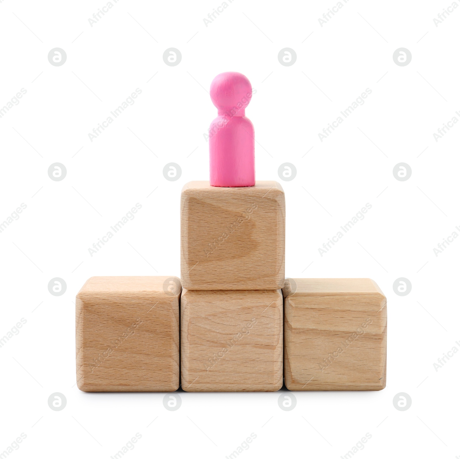 Photo of Pink human figure on wooden blocks against white background. Competition concept