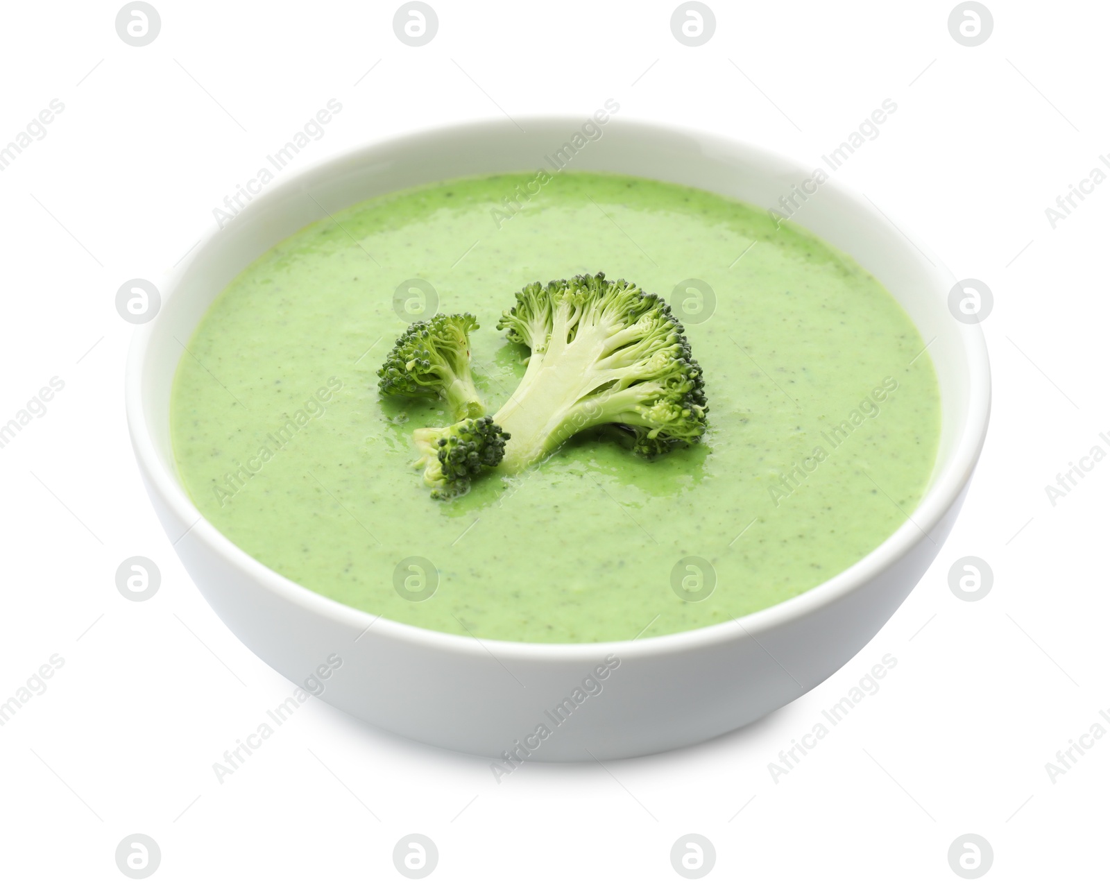 Photo of Delicious broccoli cream soup in bowl isolated on white