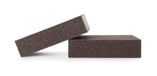 Photo of Two brown sponges isolated on white. Cleaning supply