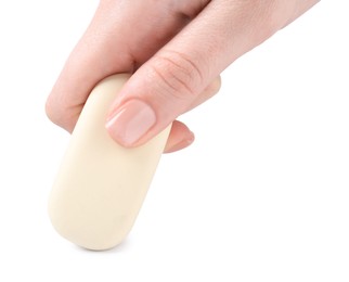 Photo of Woman using eraser on white background, closeup