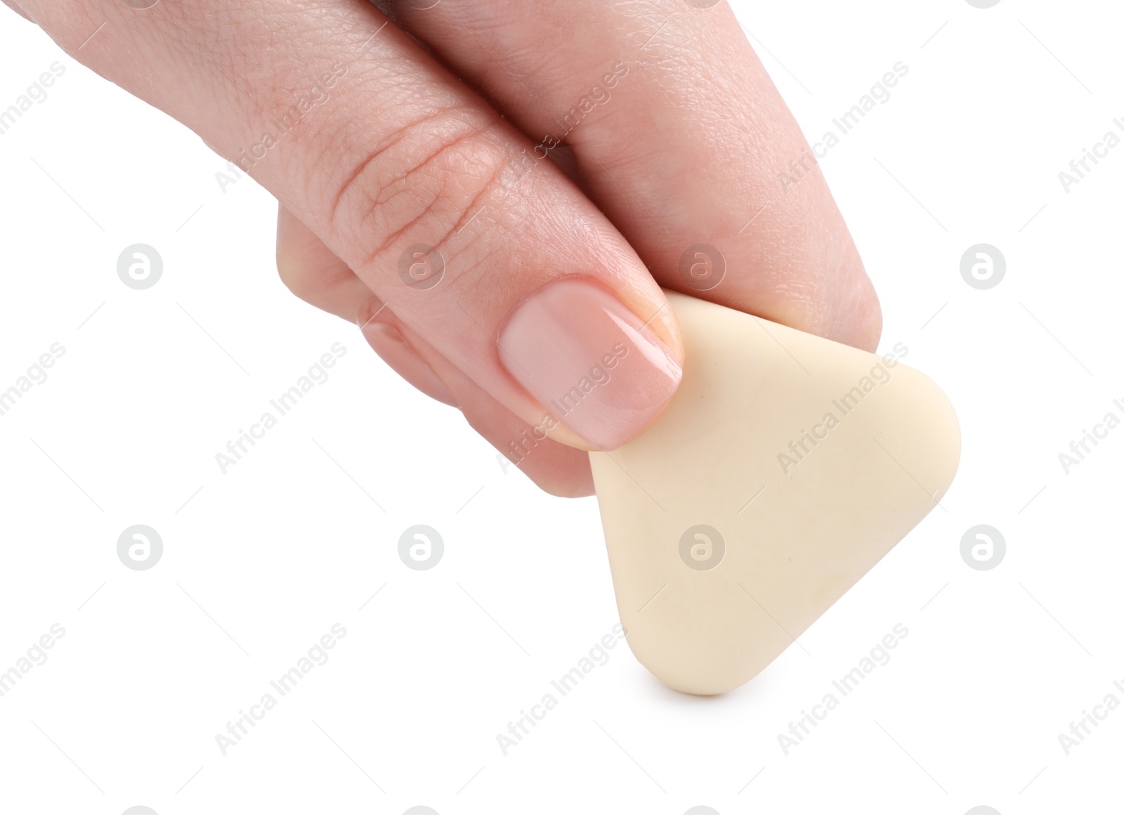 Photo of Woman using eraser on white background, closeup