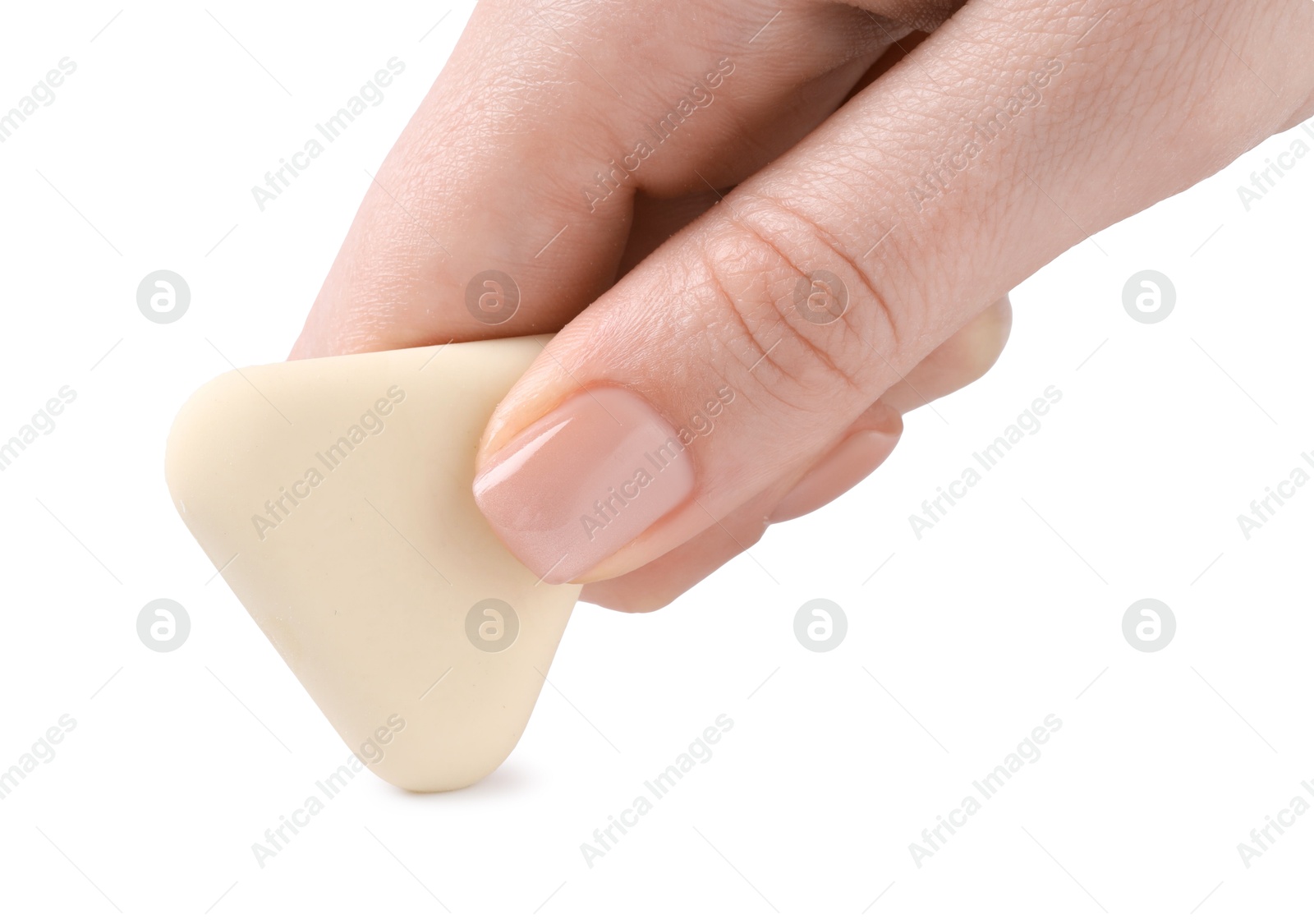 Photo of Woman using eraser on white background, closeup