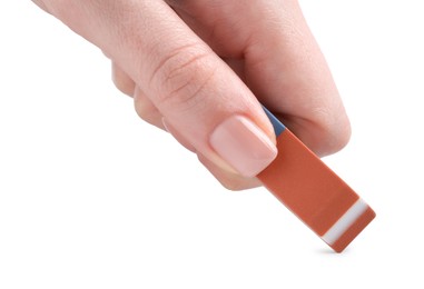 Photo of Woman using eraser on white background, closeup