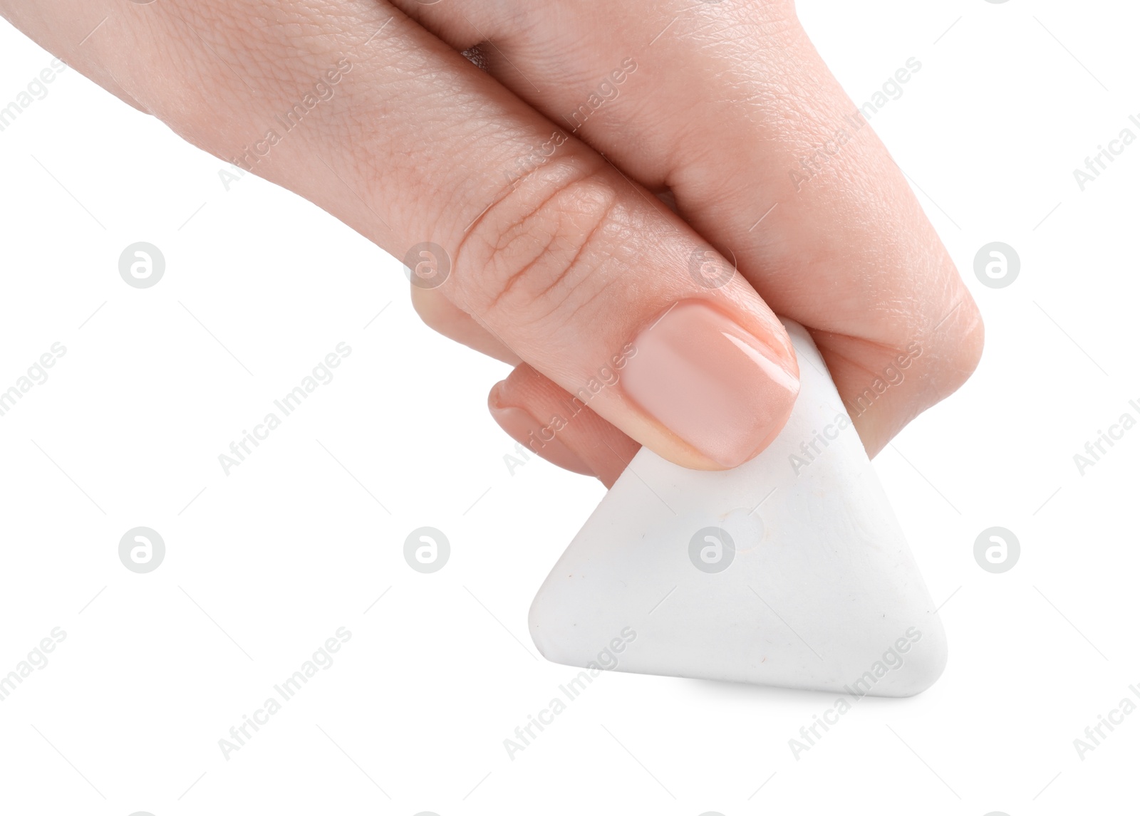 Photo of Woman using eraser on white background, closeup