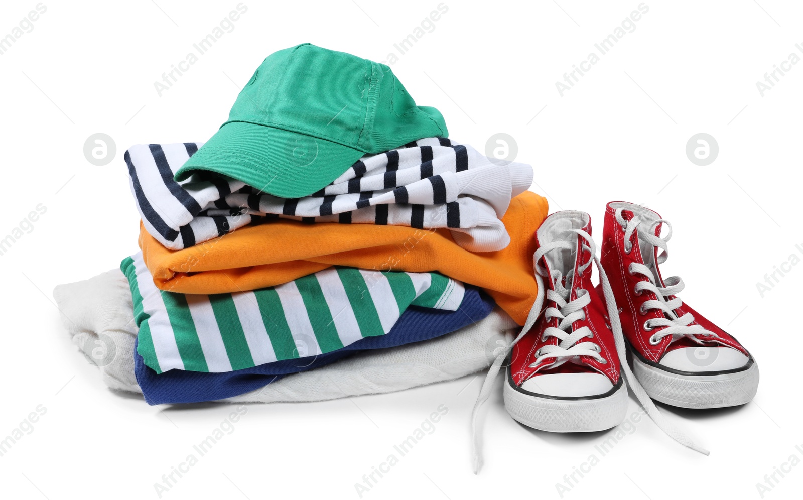 Photo of Different used clothes and shoes isolated on white